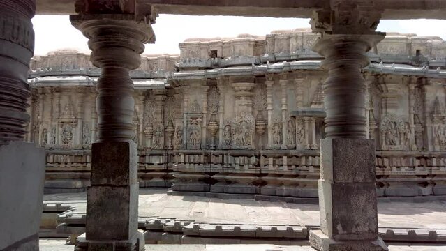 Belur, Karnataka, India-June 17 2023; A First person view of the Belur stone temple dedicated to God Vishnu, a popular tourist destination in Karnataka, India.
