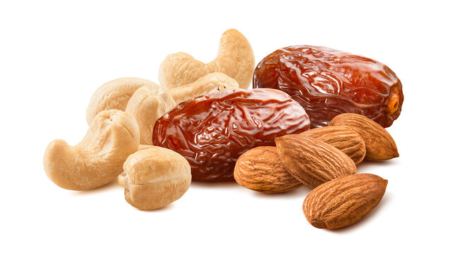 Dates, cashew and almond nuts isolated on white background