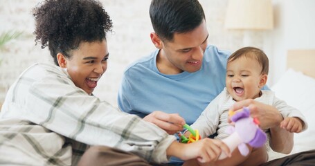 Family, couple and quality time with baby, mom and dad playing with toys for fun, laughing together...