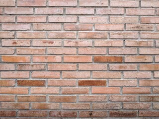 brick wall of red color, old vintage wall background.