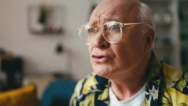 Closeup Of Grandpa Cheering For His Favorite Team, Watching TV At Home, Hobby