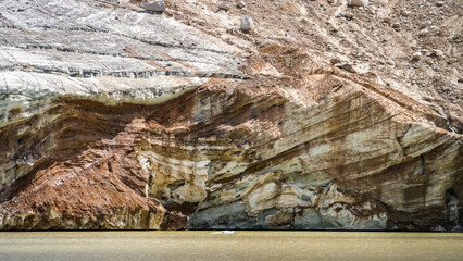a moraine lake under an ancient glacier. permafrost