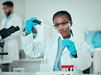 Science, blood and research, black woman with test tube in laboratory and medical engineering solution. Biotechnology, vaccine study and liquid in pipette, scientist or lab technician checking sample - Powered by Adobe