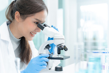 Scientist analyze biochemical samples in advanced scientific laboratory. Medical professional use...