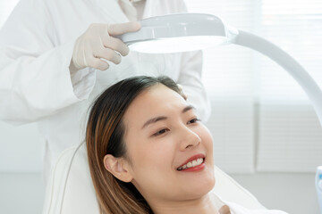 Specialist of hair recheck hair of Asian woman, damaged hair, hair loss, thinning problem, vitamin...
