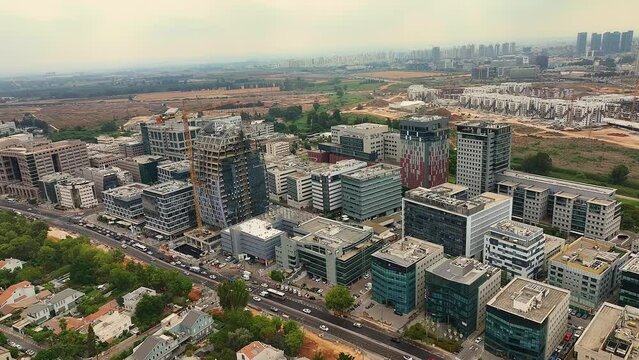 Ramat Ha Hayal industrial hi-tech zone and in Tel Aviv aerial drone view 4k, Israel