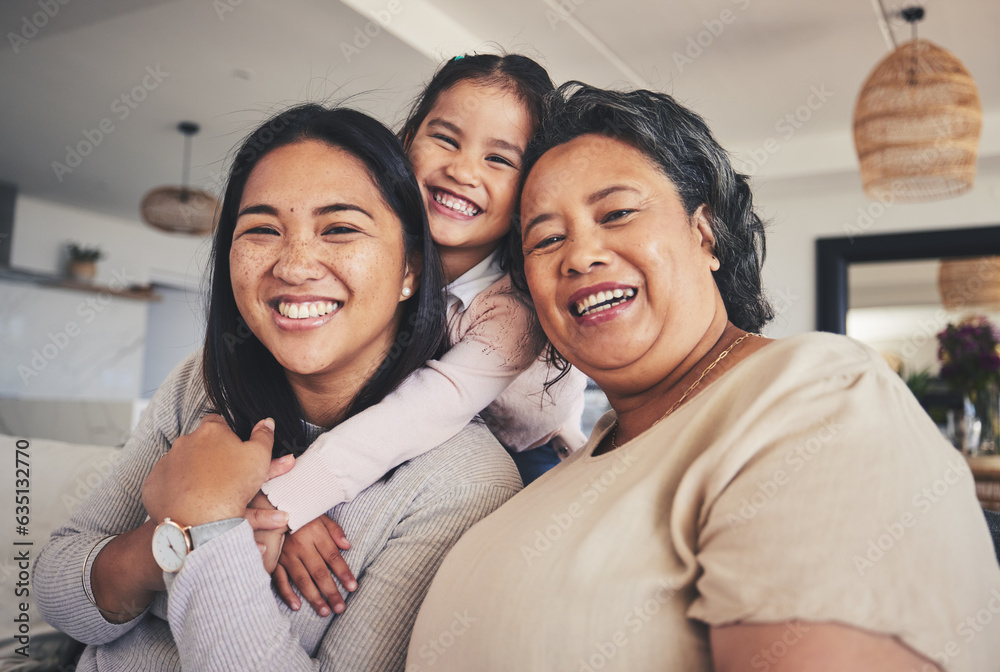 Wall mural Hug, women and generations with portrait of family on sofa for smile, bonding and support. Happy, relax and grandparent with mother and child in living room at home for calm, care and peace together