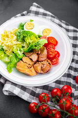 chicken liver salad tomato, green leaf lettuce, boiled egg, farfalle pasta pasta salad ready to eat healthy meal food snack on the table copy space food background rustic top view
