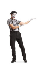Full length portrait of a mime presenting