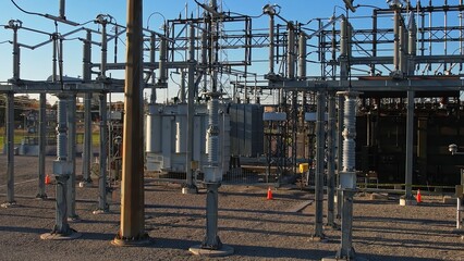 Electrical substation or electric grid of high voltage power lines and wires. Energy transmission...