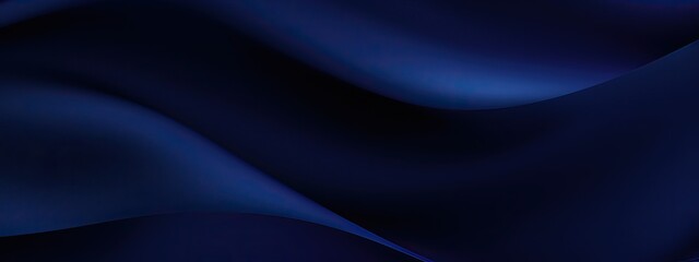 Abstract dark blue background. Silk satin. Navy blue color. Elegant background with space for design. Soft wavy folds.