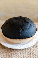 Special round black cake made from eggs and butter in Poitou, France