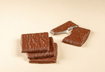 Filled dark chocolate bars, one broken into two pieces
