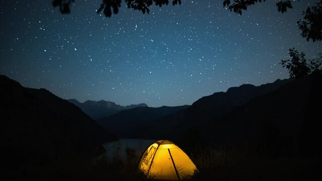 wanderlust cinematic travel video, single camping in the mountain, timelapse night sky stars and Milky Way over hiking camping tent mountains lake rising moon perseids meteor shower