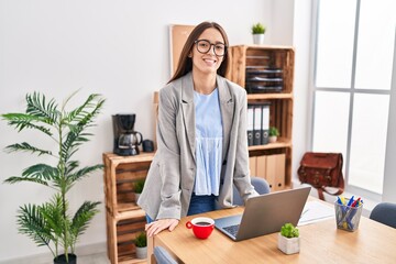 Young beautiful hispanic woman business worker smiling confident standing at office