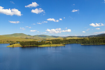 Zlatibor Summer.
Serene altitude lake embraced by mountains