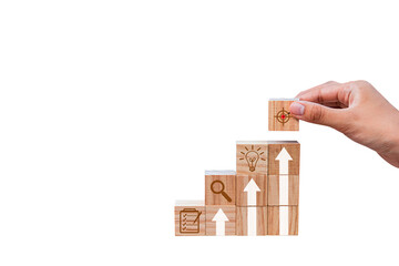 Place wooden blocks as a step towards the goal. Business ideas for successful growth process.PNG