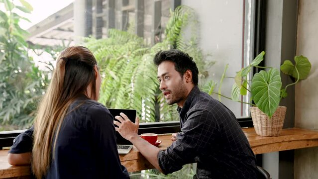 Owner Cafe Bakery, Asian Couple Recently Opened Shop, Managing Daily Income Expenses Cafe, Manage Management Cafe Bakery Shop Well, Two People Chatting Exchanging Ideas After Shop Closes.