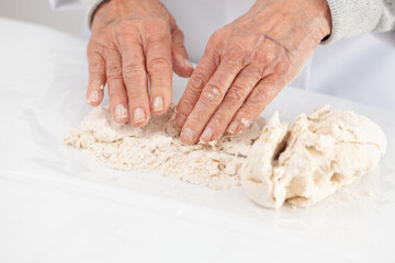 kneading by hand. Home made pizza dough preparation. Pizza preparation.