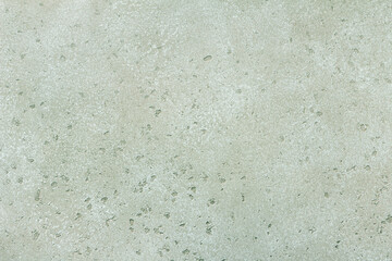 Light gray green stone background, wall or floor. Abstract texture for graphic design or wallpaper