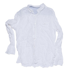 Obraz premium Crumpled shirt on white background, top view