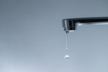Tap with dripping water