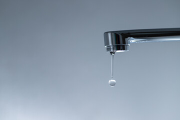 Tap with dripping water