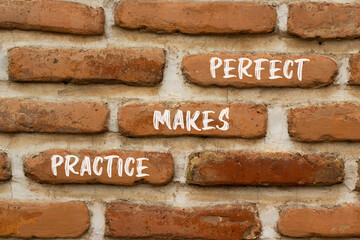 Practice makes perfect symbol. Concept words Practice makes perfect on beautiful brown brick. Beautiful red brown brickwall background. Business practice makes perfect concept. Copy space.