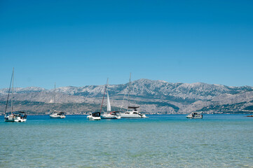 Adriatic sea with many motor yachts and mountains