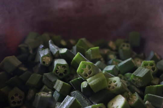 Smoky green Okra , Lady Finger, Bhindi sabzi , Vegetable frying in the kadahi pan 