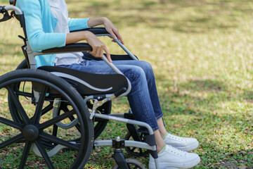 Obraz premium Depressed sad asian woman in wheelchair&nbsp;lonely disabled adult