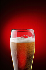 full glass mug with beer and bubbles