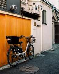 bicycle in front of a wall