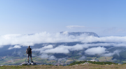 Man watching the weather and clouds from the Aralar mountain range, Navarre