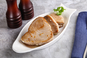 Roasted red tuna steak in the plate