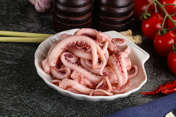 Delicous marinated squid tentacles in the bowl