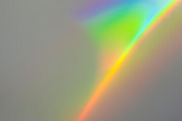 Rainbow reflection of light on the wall.