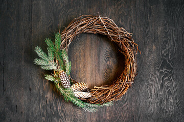 Christmas decoration on the wooden background, natural festive wreath - 635203351