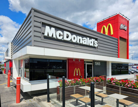 TORONTO, CANADA-AUGUST 11, 2023: McDonald&rsquo;s Restaurant entrance. McDonald's is one of the largest fast-food franchise in Canada. It serves over 1,460 locations with 90,000+ employees. Copy Space