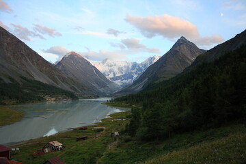 Obraz premium Evening view of Akkem lake in summer. Altai mountains. Belukha peak in the back