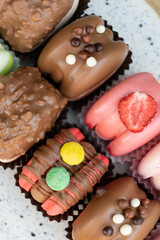 Colored macaroons with decoration for those with a sweet tooth close up.