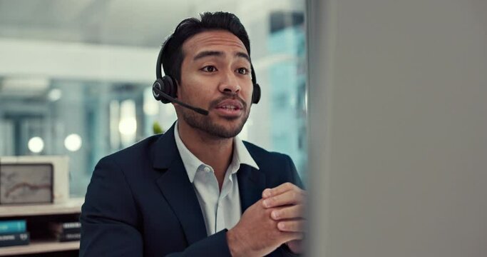 Businessman, call center and virtual meeting in customer service, support or telemarketing at the office. Happy asian man, consultant or agent wave in hello with headphones for online advice or help
