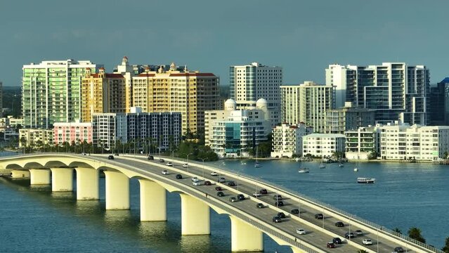 Above view of Sarasota city, Florida with waterfront office highrise buildings and John Ringling Causeway leading from downtown to St. Armands Key. Development of housing and transportation in the US