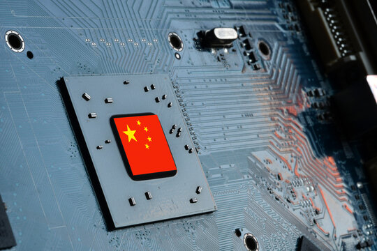 China flag on a processor, central processing unit CPU or GPU microchip on a motherboard or graphic card. Concept for the battle of global microchips production between China, Taiwan, Korea and USA.