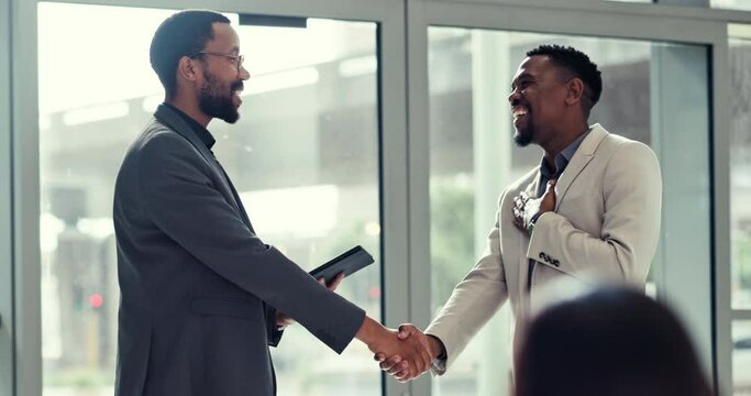 Businessman, handshake and meeting in b2b, partnership or presentation at office seminar or conference. Business people shaking hands in agreement, thank you or promotion or introduction at workplace