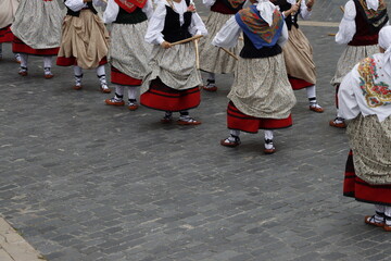 Basque folk dancers during a performance in an outdoor festival
