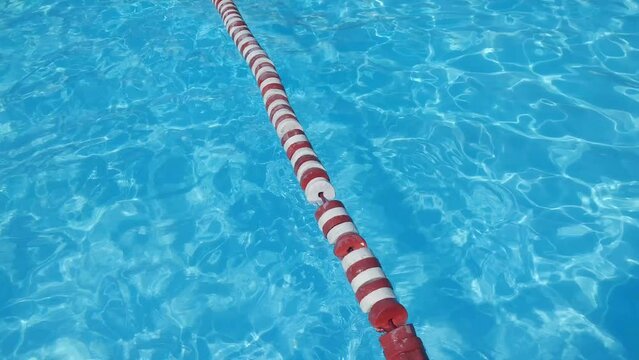 Floating barrier in pool.