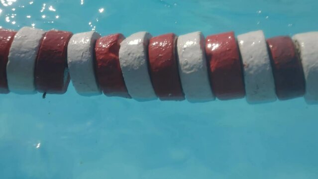 Floating barrier in pool.