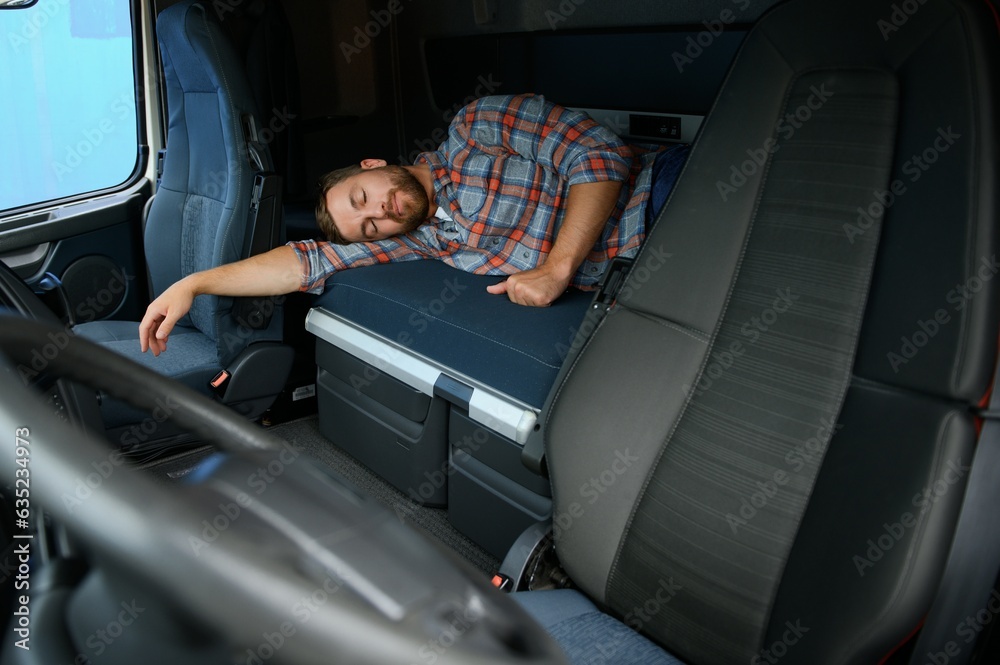 Canvas Prints truck driver sleeping on bed inside truck cabin interior. trucker lifestyle.