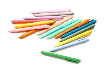 Colorful pens on white background